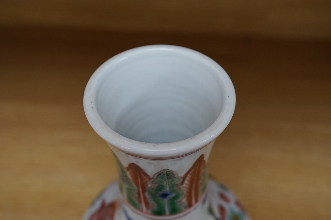 A Chinese wucai ‘fish and flower’ vase, 26cm